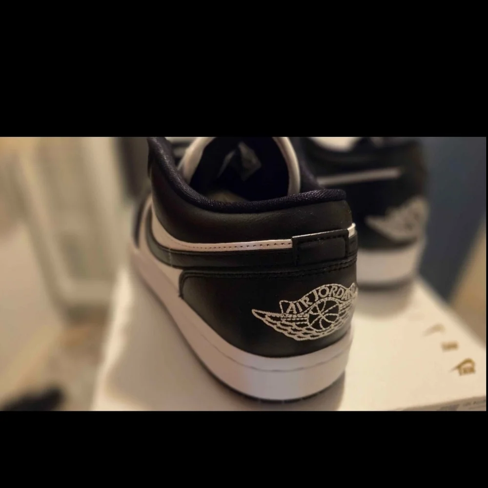 Jordan Women's Low Top Sneakers in Black and White - Picture 6 of 8